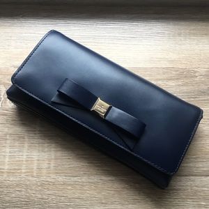 Kate Spade New York Kiera handheld clutch